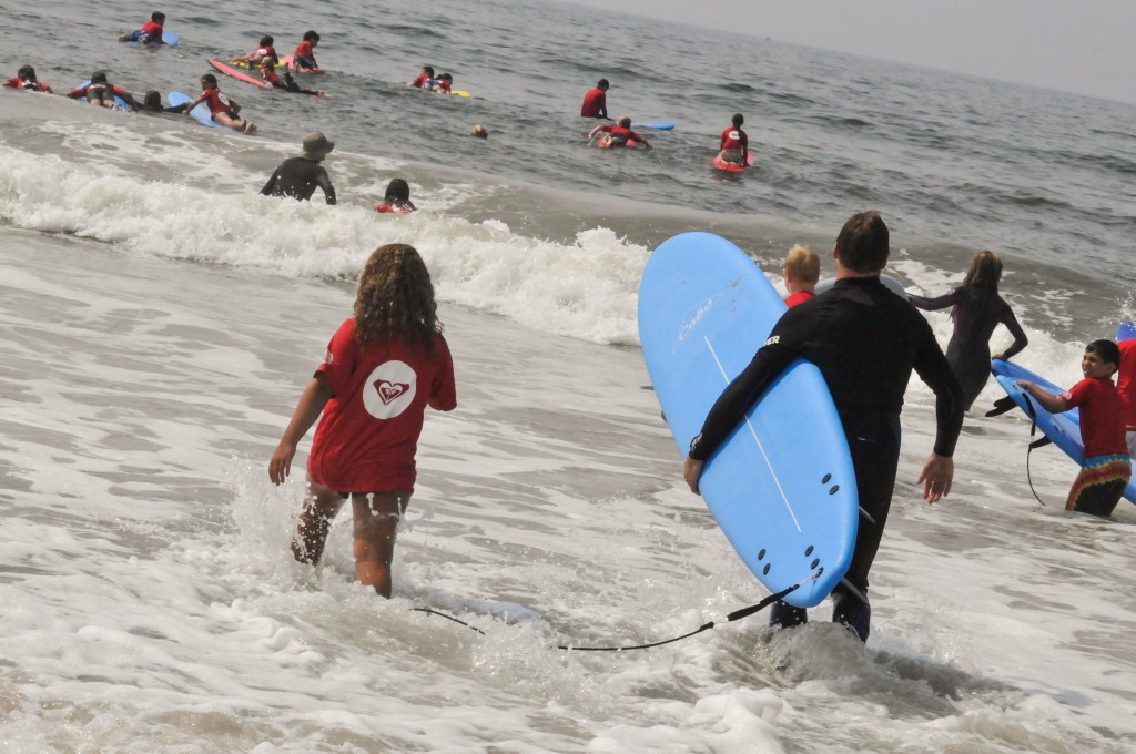 The Skudin family has made a life out of teaching surfing on Long Beach. (Photo by Frank Posillico)